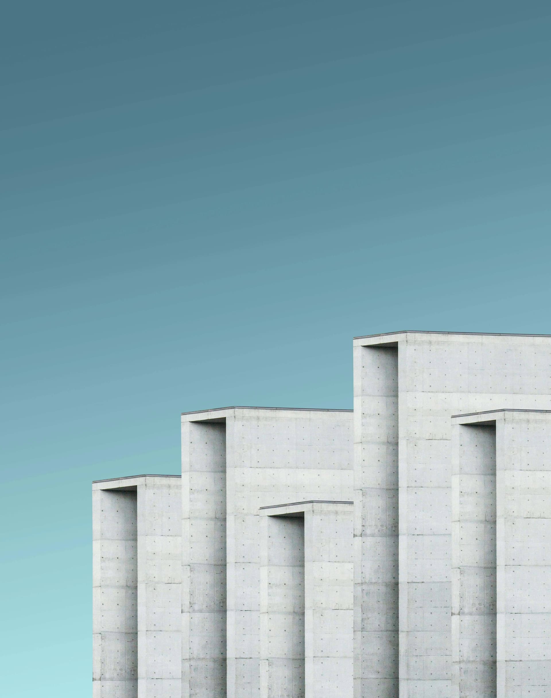 Concrete residential building under a blue sky