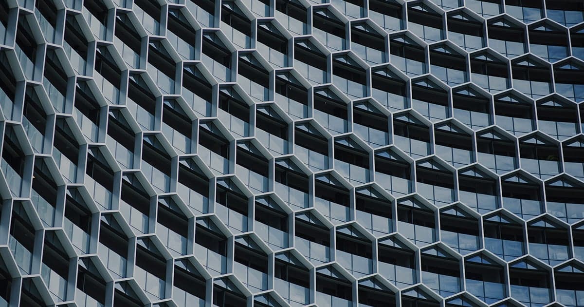 building with interlocking windows that simulate blockchain